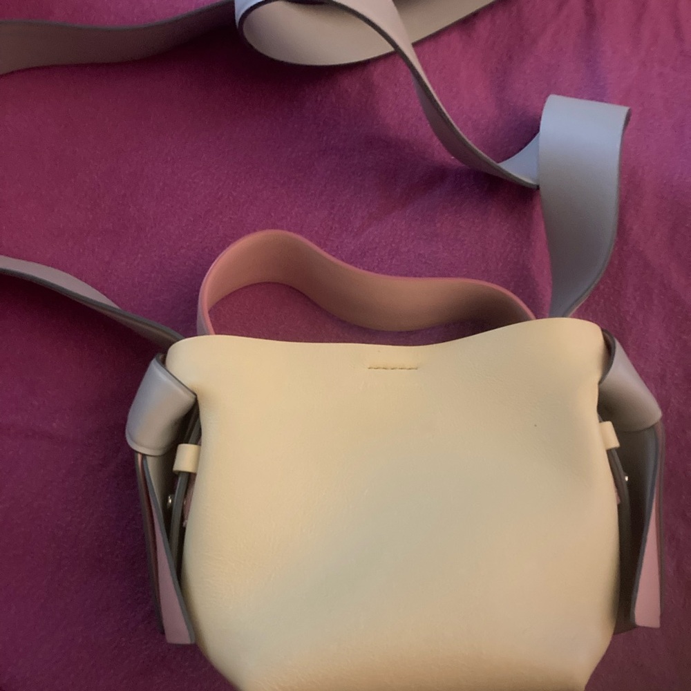 Acne Studios mint green, baby pink and yellow micro handbag.